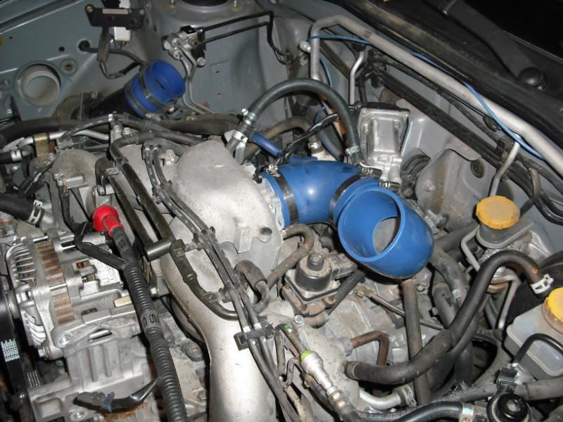 Illustration for article titled Garage Mechanic Ghetto-Rigs Subaru Impreza With Eaton Supercharger